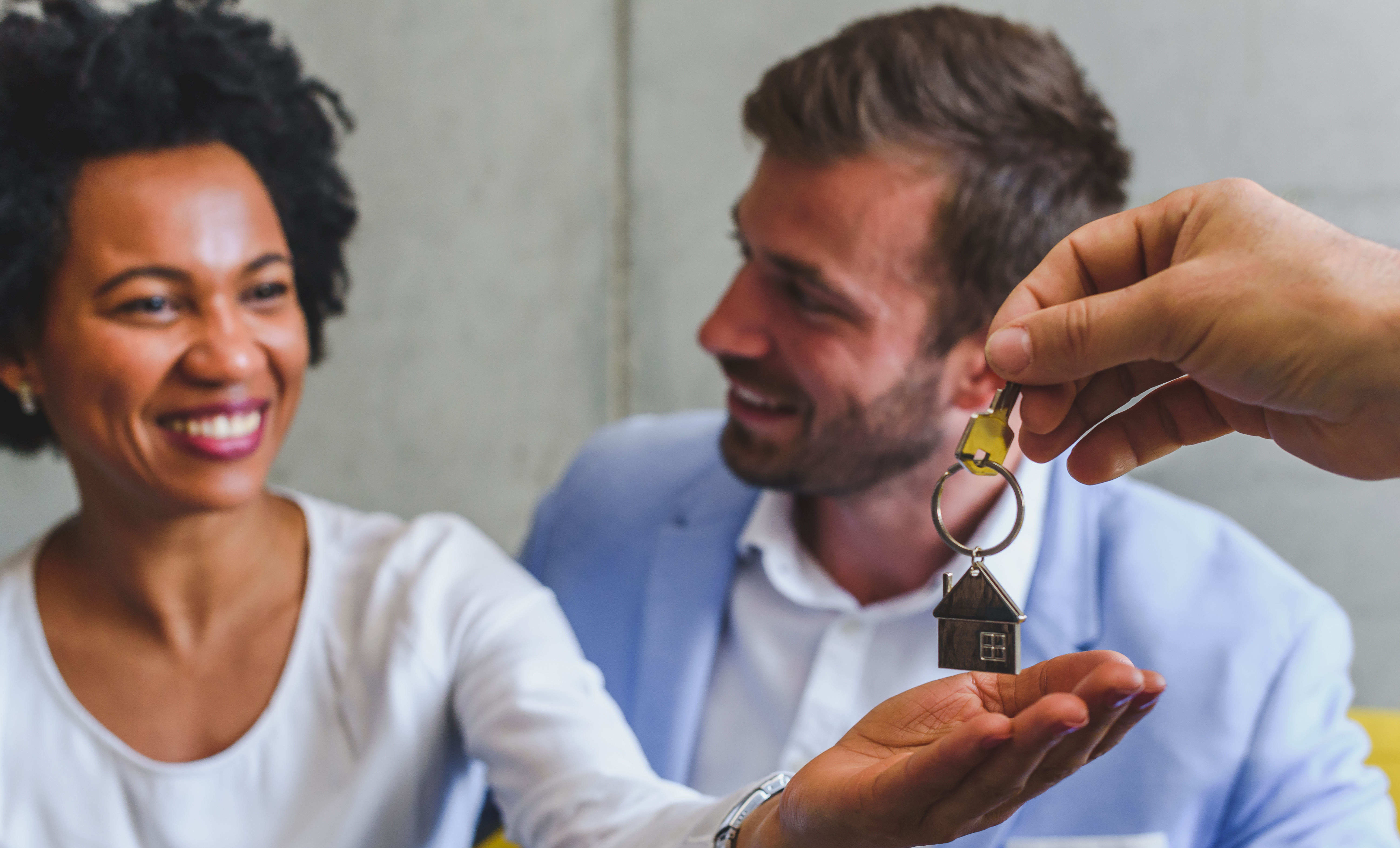 mixed race couple buying home