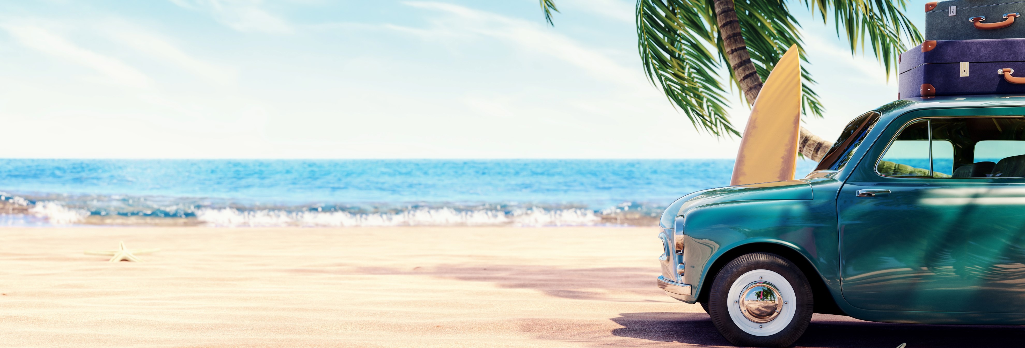 Beach scene with car and luggage