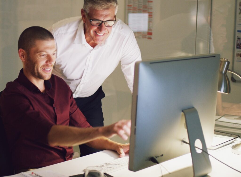 two men at computer